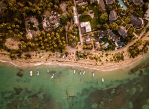 Aerial shot beach houses real estate due diligence in Brazil